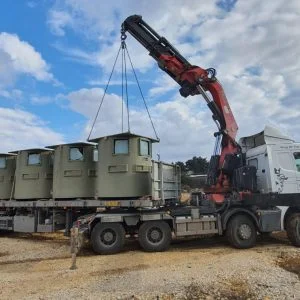 bullet resistant booths unloaded from a truck