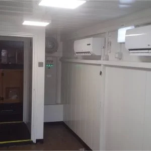 Two air conditioning units and passageway to separate equipment room